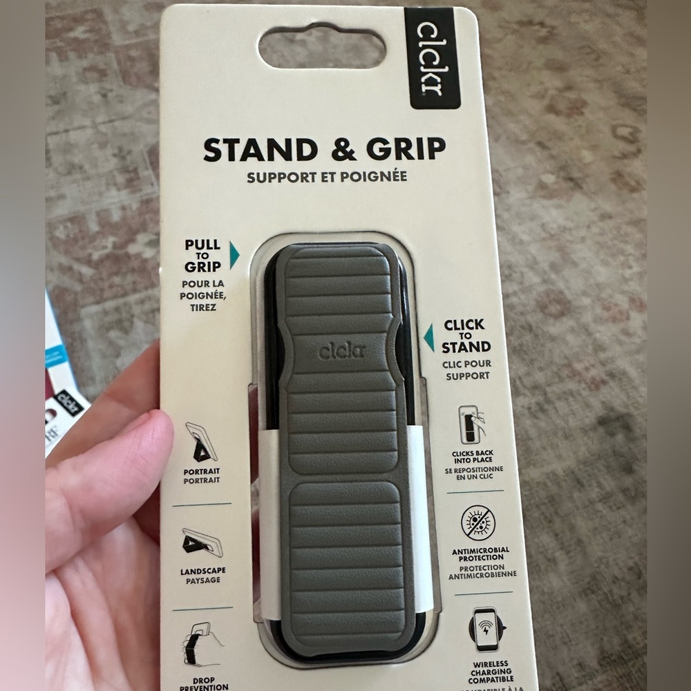 Clikr Grip and Stand phone attachment. Black and grey, leather feel.